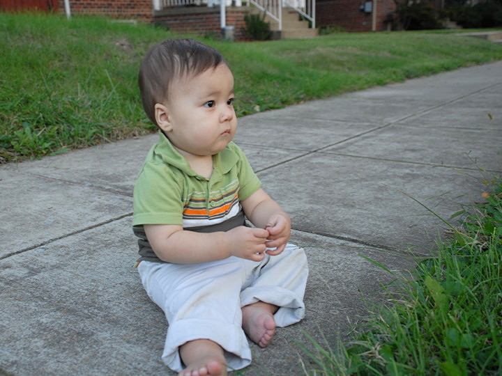 contemplative on sidewalk
