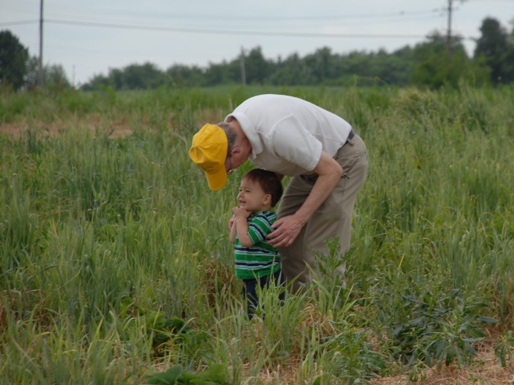 with grandpa in field