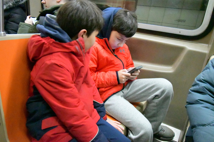 with phone, on subway