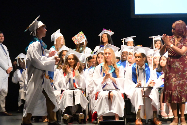 on stage for graduation