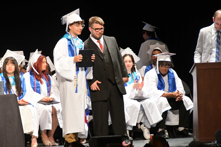 graduation picture with Principal Nace
