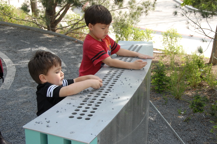 helps Matthew with gravel chimes