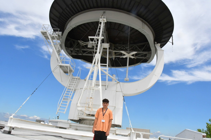 under the satellite dish